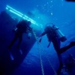Divers under the boat